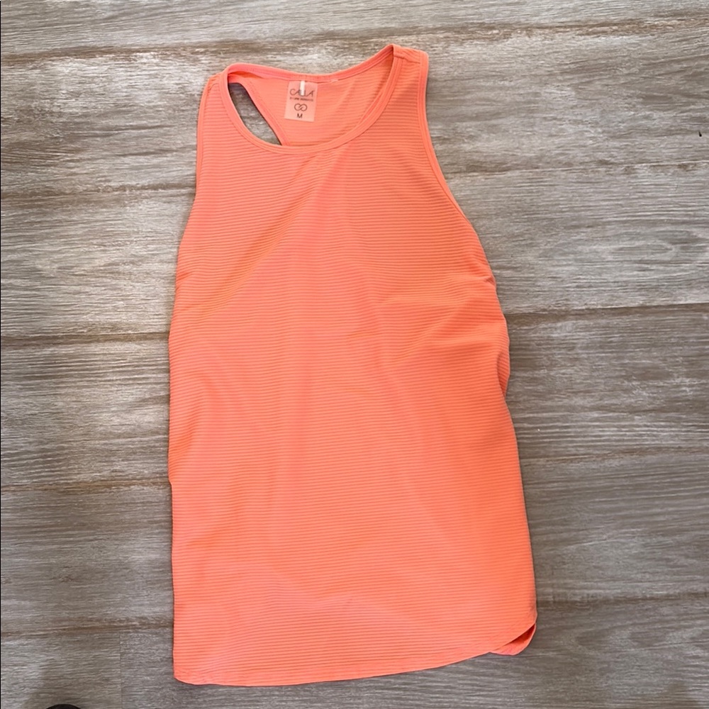 Calia orange tank. The sides open at the back.